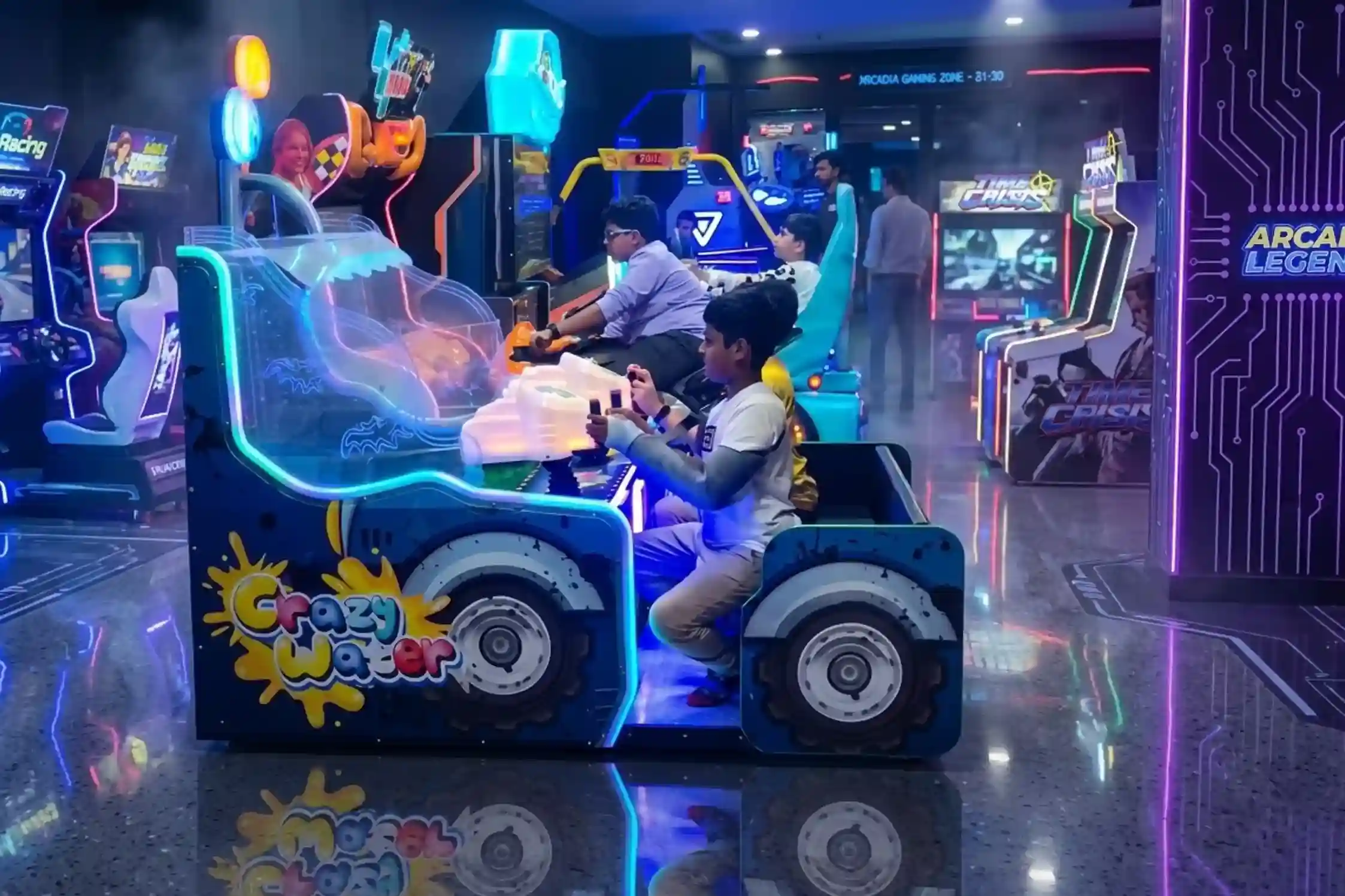 Two boys riding the Crazy Water arcade game at Game Xtreme